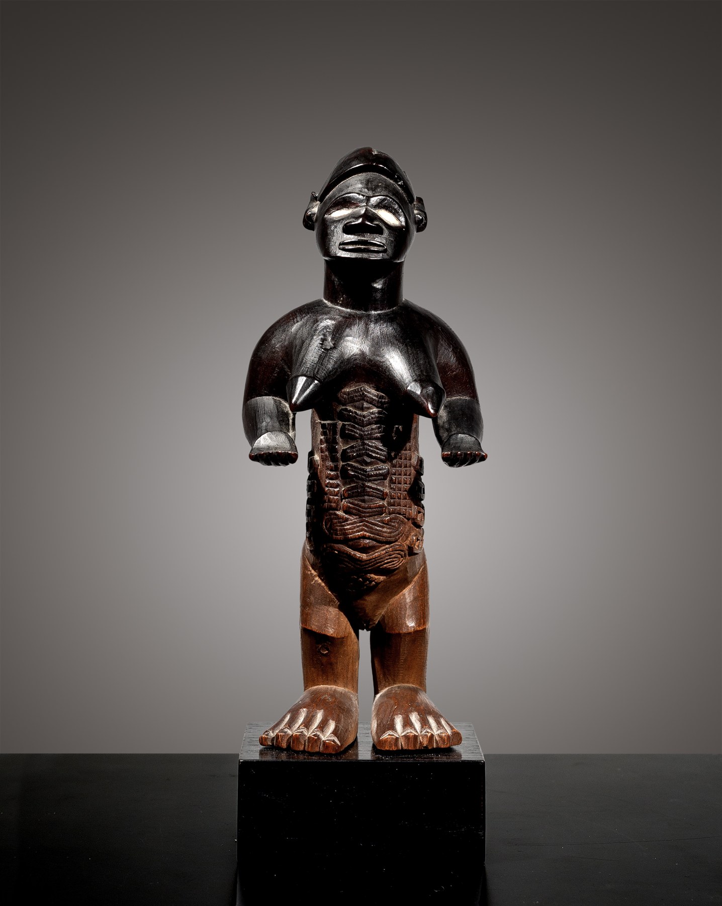 Bembe female ancestor figure – front view Bembe female ancestor figure, D.R. Congo, late 19th–early 20th century, wood and porcelain, front view