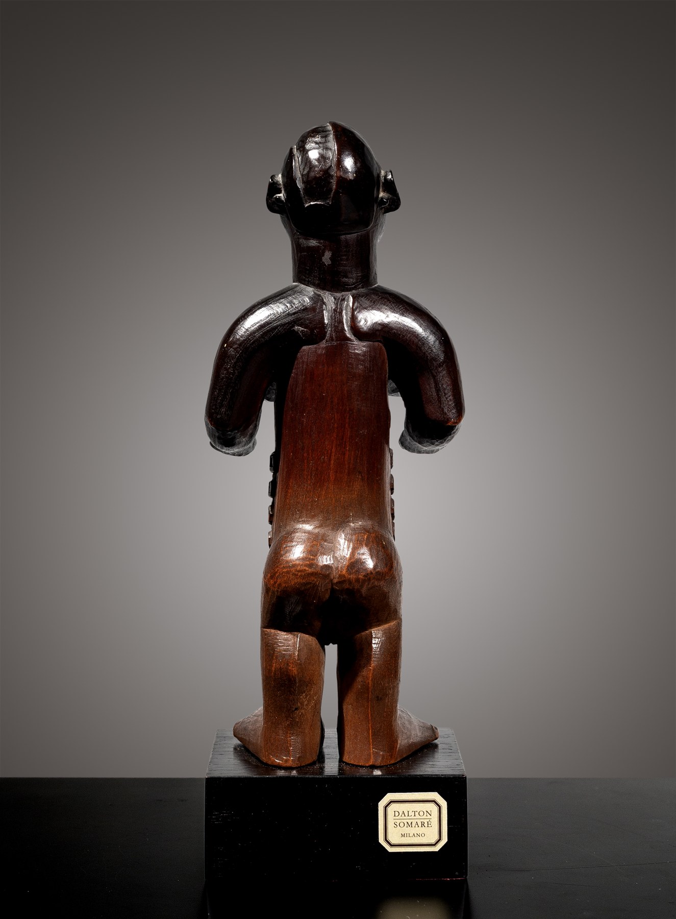 Bembe female ancestor figure – rear view Bembe female ancestor figure, D.R. Congo, late 19th–early 20th century, wood and porcelain, rear view